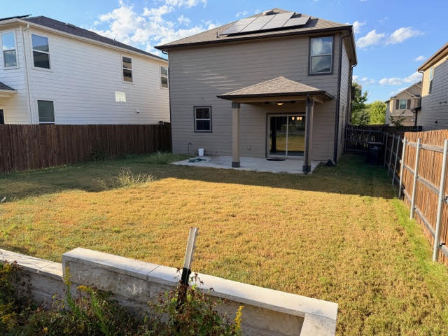 329 Los Cobos Lane Georgetown, TX 78626 - Photo 36 of 40 a front view of a house with a yard