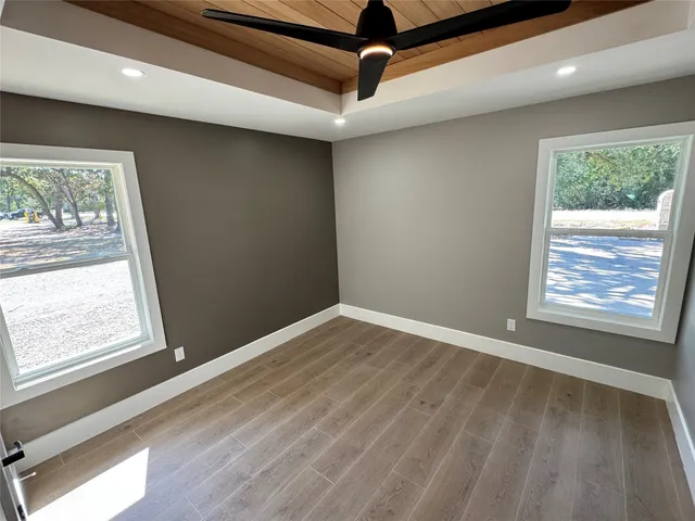 a view of an empty room and window