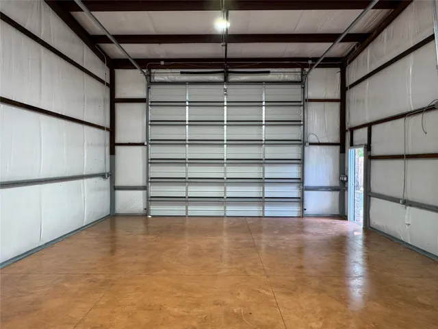 a view of a room with racks on the wall