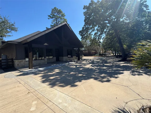 a outdoor view of a house with garage