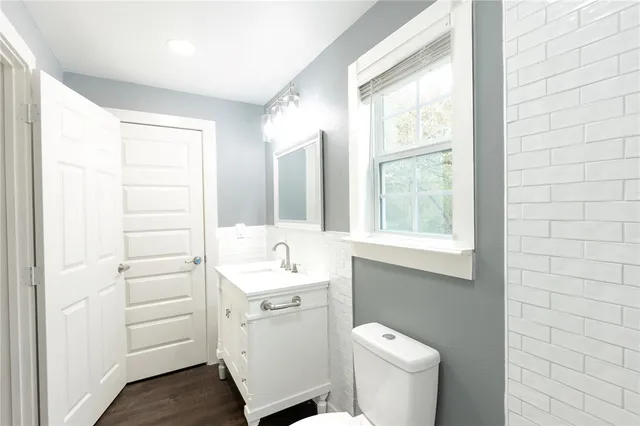 a bathroom with a toilet sink and a bathtub