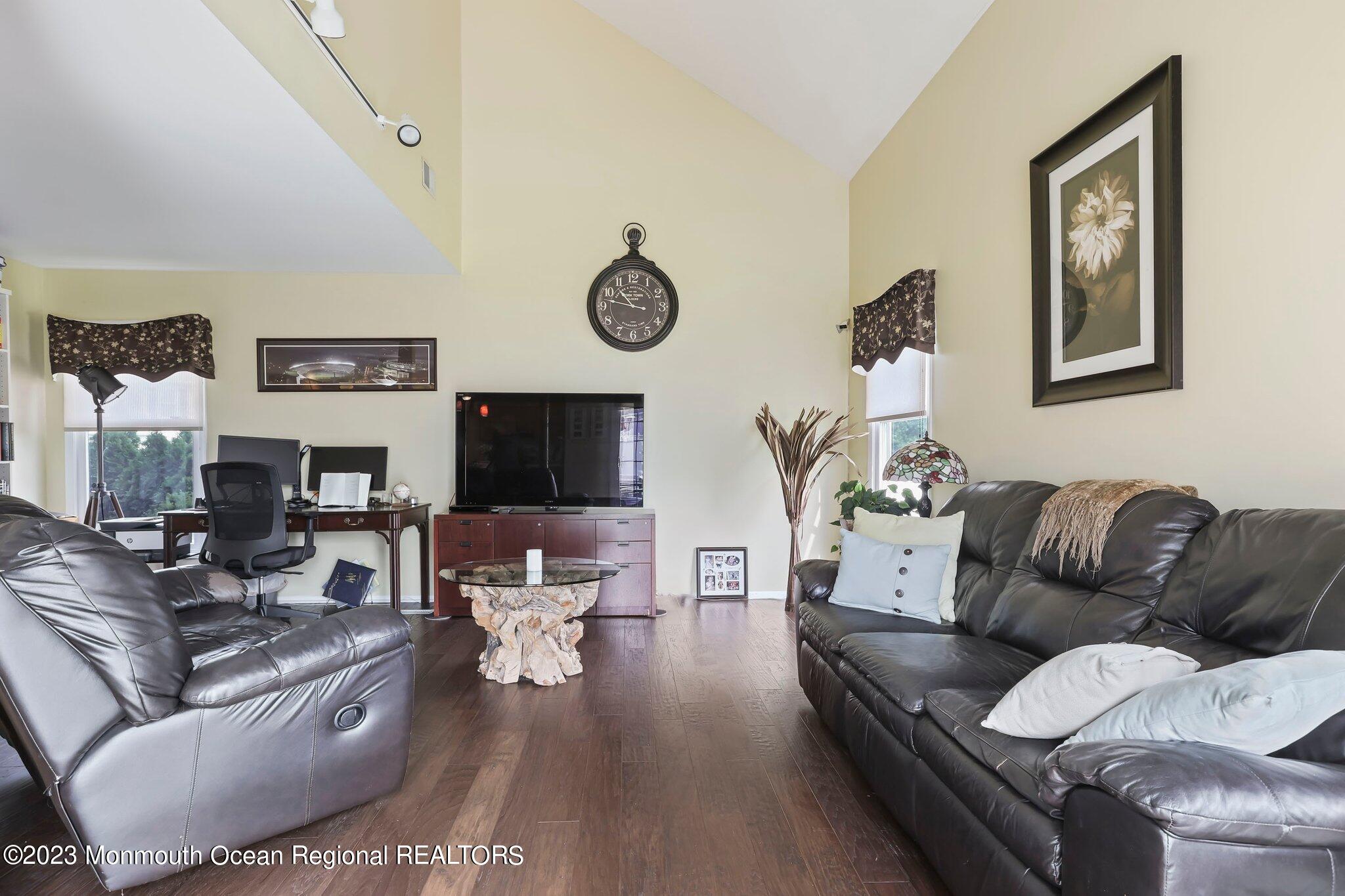 31 Daniel Drive Hazlet, NJ 07730 - Photo 14 of 31 a living room with furniture and a flat screen tv