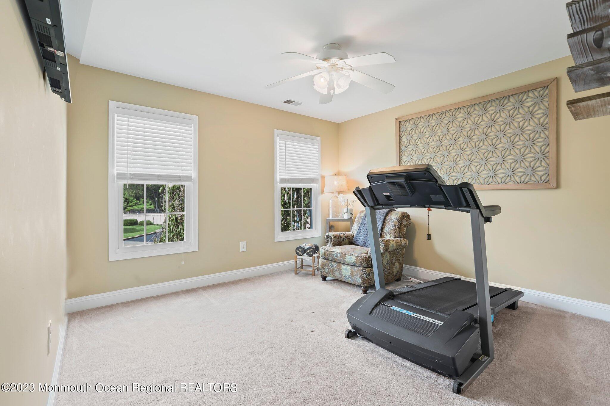 31 Daniel Drive Hazlet, NJ 07730 - Photo 23 of 31 a living room with furniture and a window