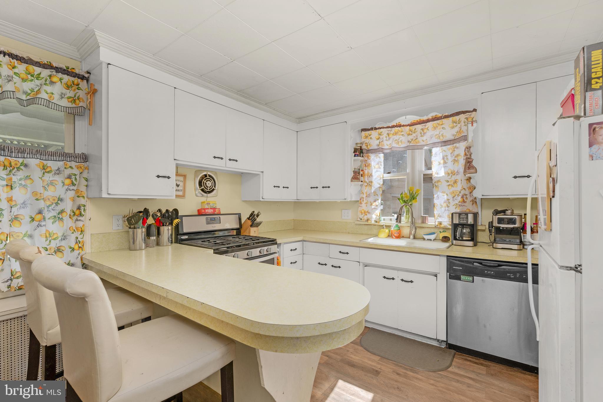 730 McAllister Street Hanover, PA 17331 - Photo 11 of 46 a kitchen with a sink cabinets and wooden floor