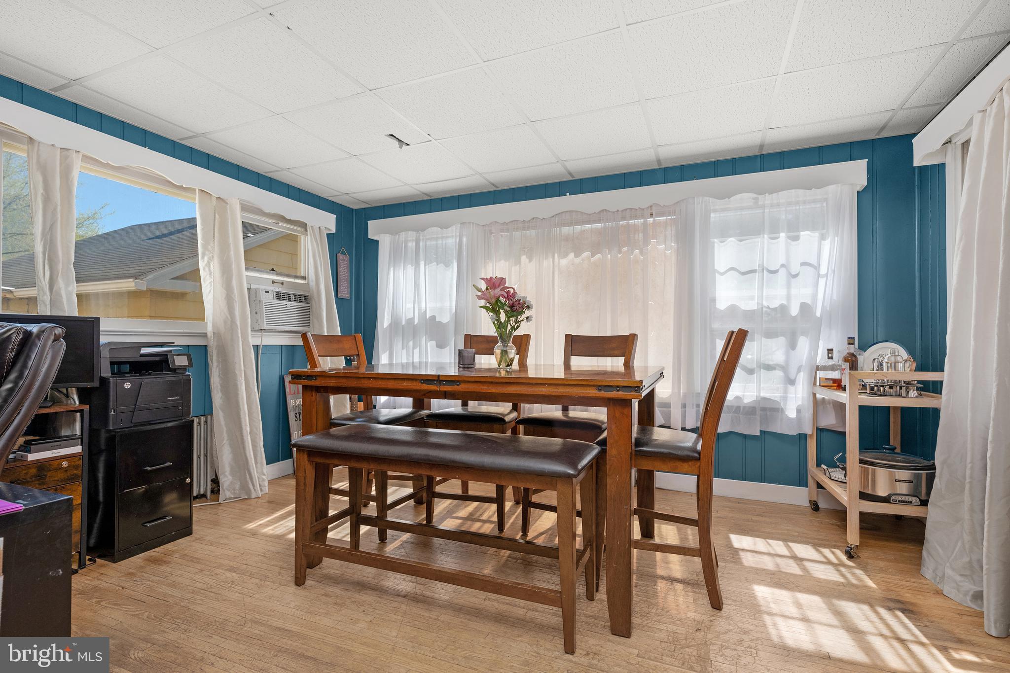 730 McAllister Street Hanover, PA 17331 - Photo 15 of 46 a view of a dining room with furniture window and wooden floor