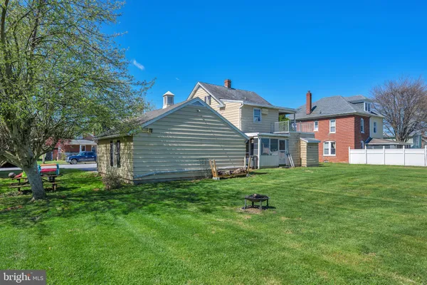 a view of a house with a big yard