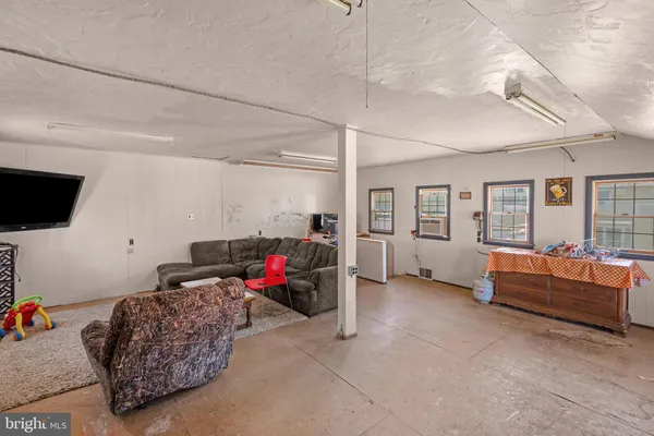 a living room with furniture and a couch