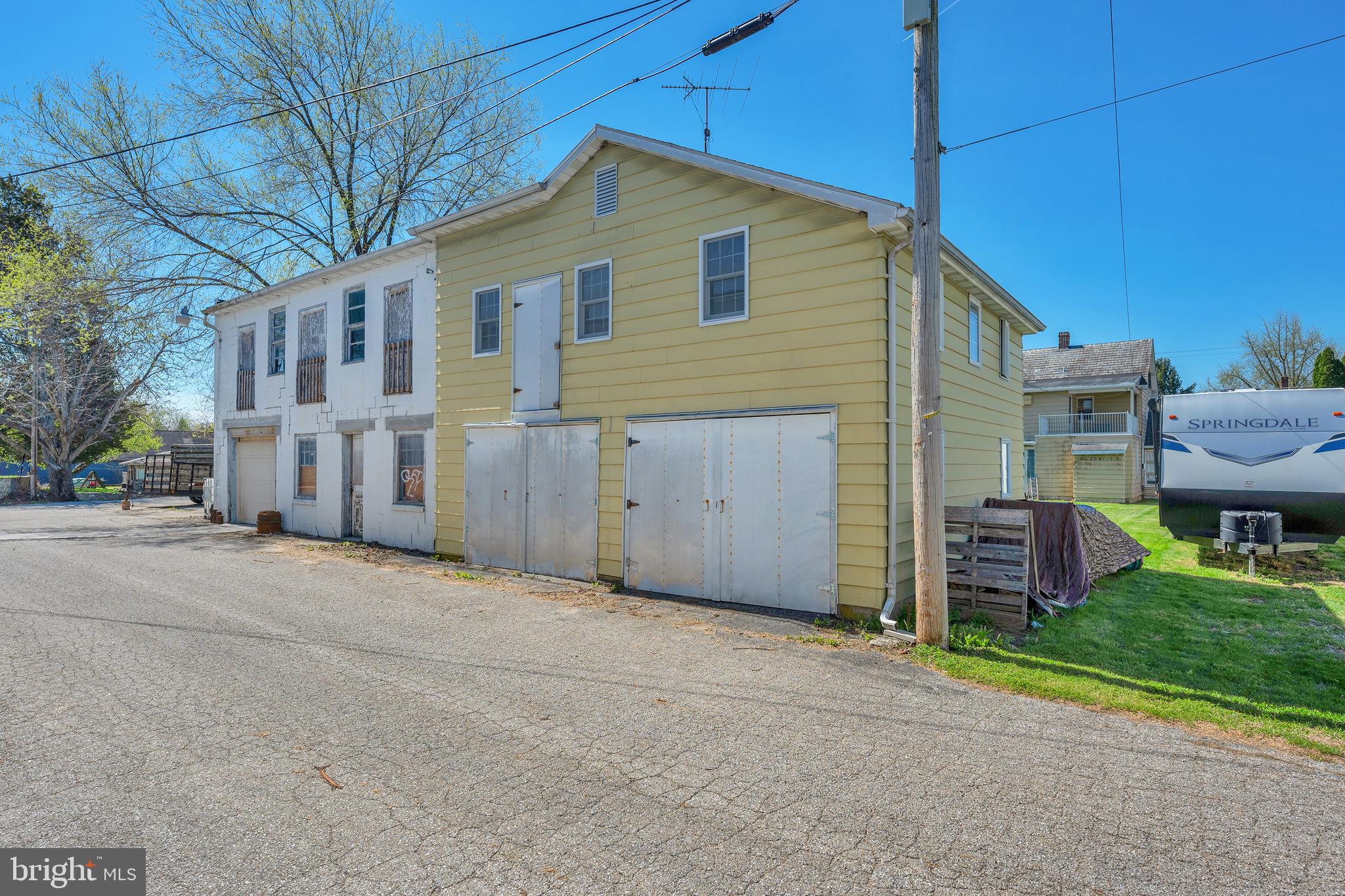 730 McAllister Street Hanover, PA 17331 - Photo 43 of 46 a view of a house with a yard and garage