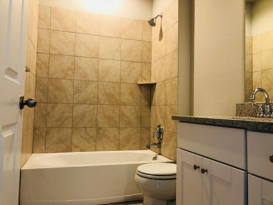 1308 Eagle Ridge Trail Leander, TX 78641 - Photo 11 of 16 Full bathroom with vanity and shower / bathtub combination