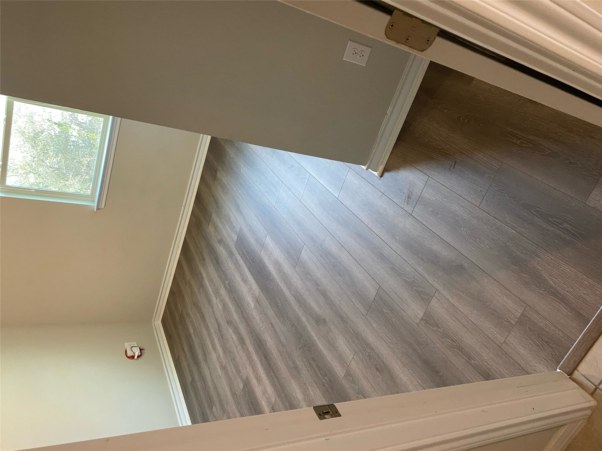 1308 Eagle Ridge Trail Leander, TX 78641 - Photo 14 of 16 Unfurnished room with baseboards and dark wood-type flooring