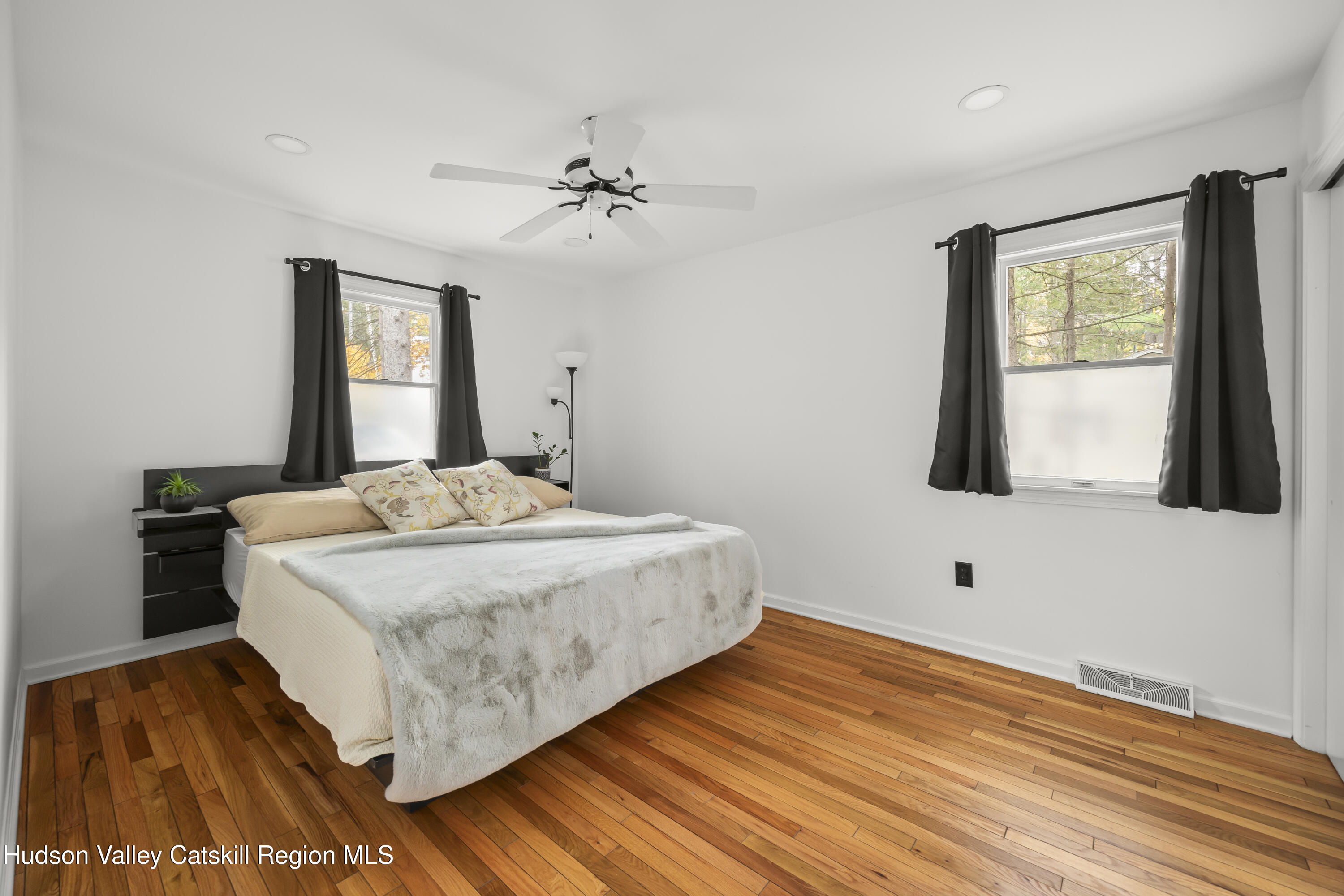 1256 Lakeview Road Copake, NY 12516 - Photo 20 of 37 a bedroom with a bed and a window