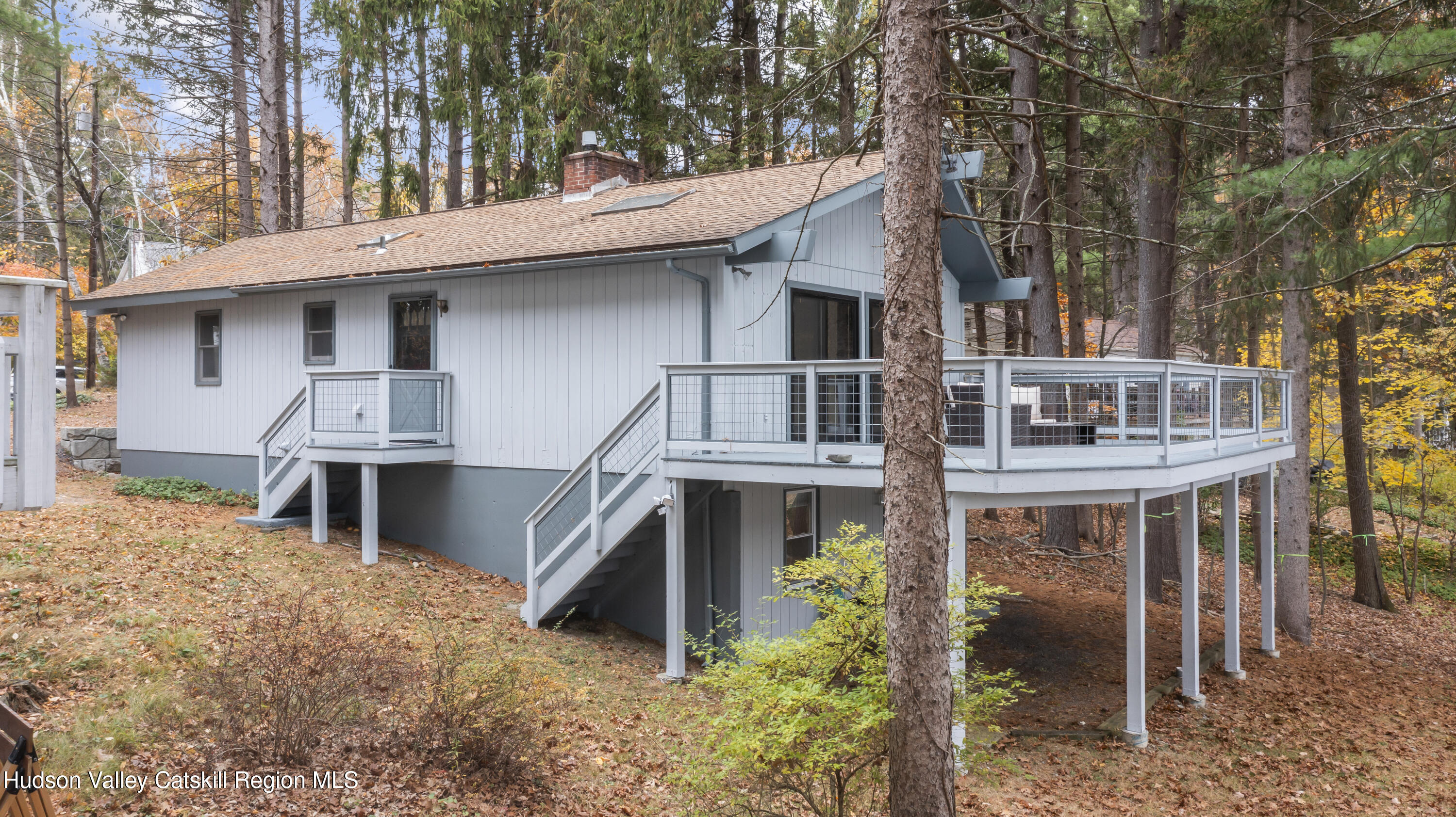 1256 Lakeview Road Copake, NY 12516 - Photo 3 of 37 a front view of a house with balcony