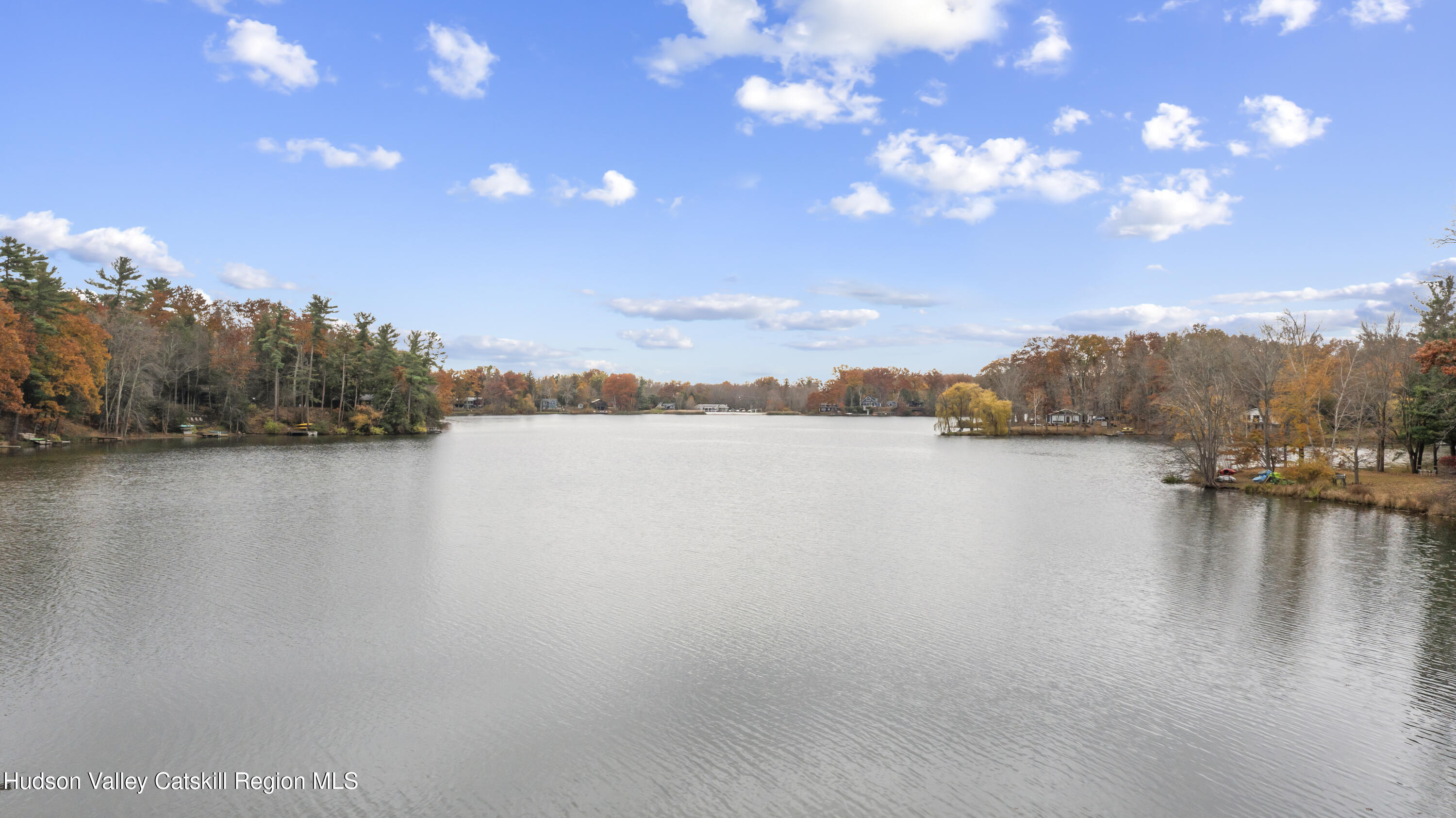 1256 Lakeview Road Copake, NY 12516 - Photo 36 of 37 a view of a lake with houses