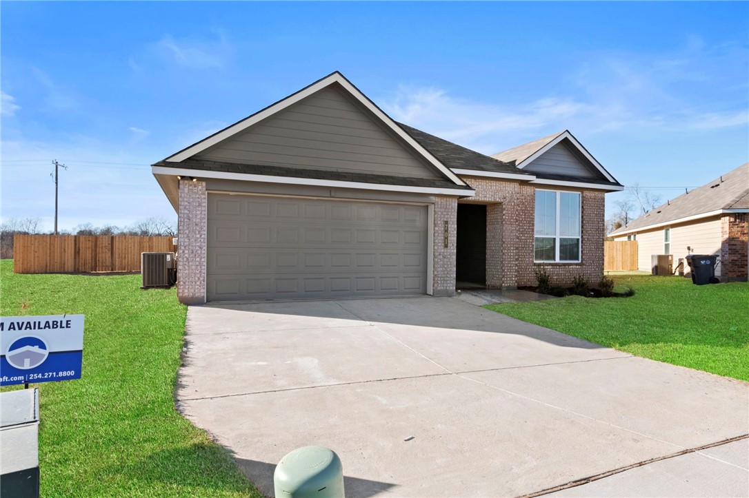 a front view of house with yard