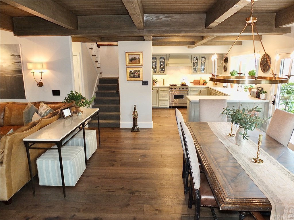 5273 Appian Way Long Beach, CA 90803 - Photo 13 of 34 a dining room with furniture and wooden floor