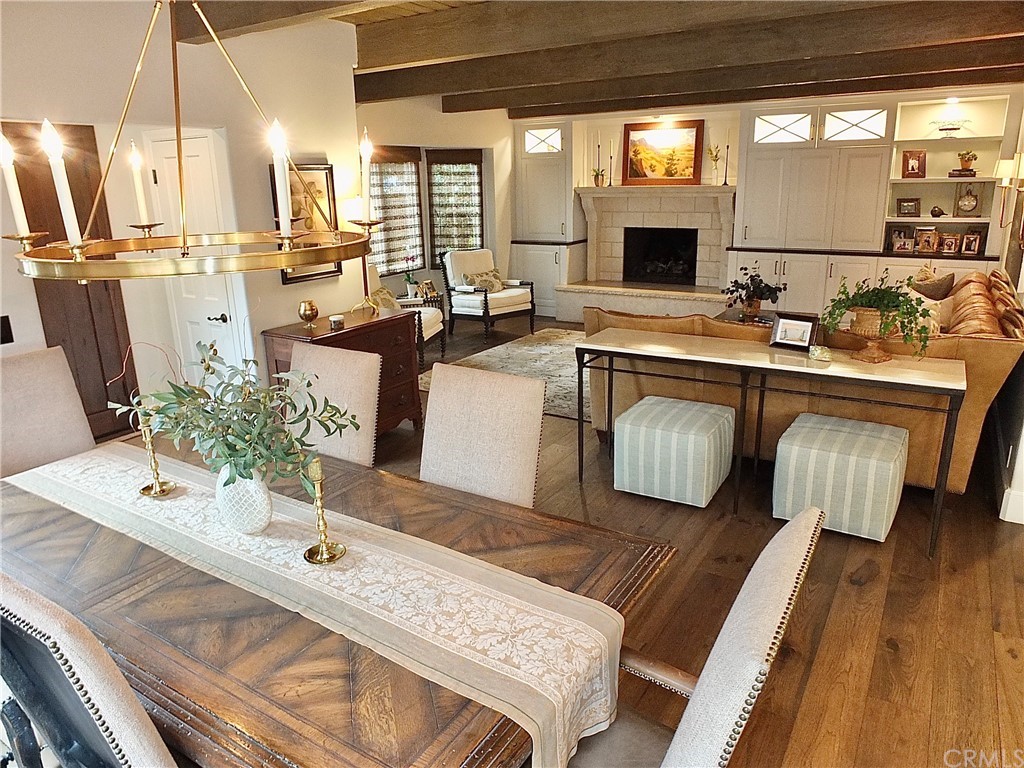 5273 Appian Way Long Beach, CA 90803 - Photo 17 of 34 a living room with stainless steel appliances furniture a fireplace and a flat screen tv