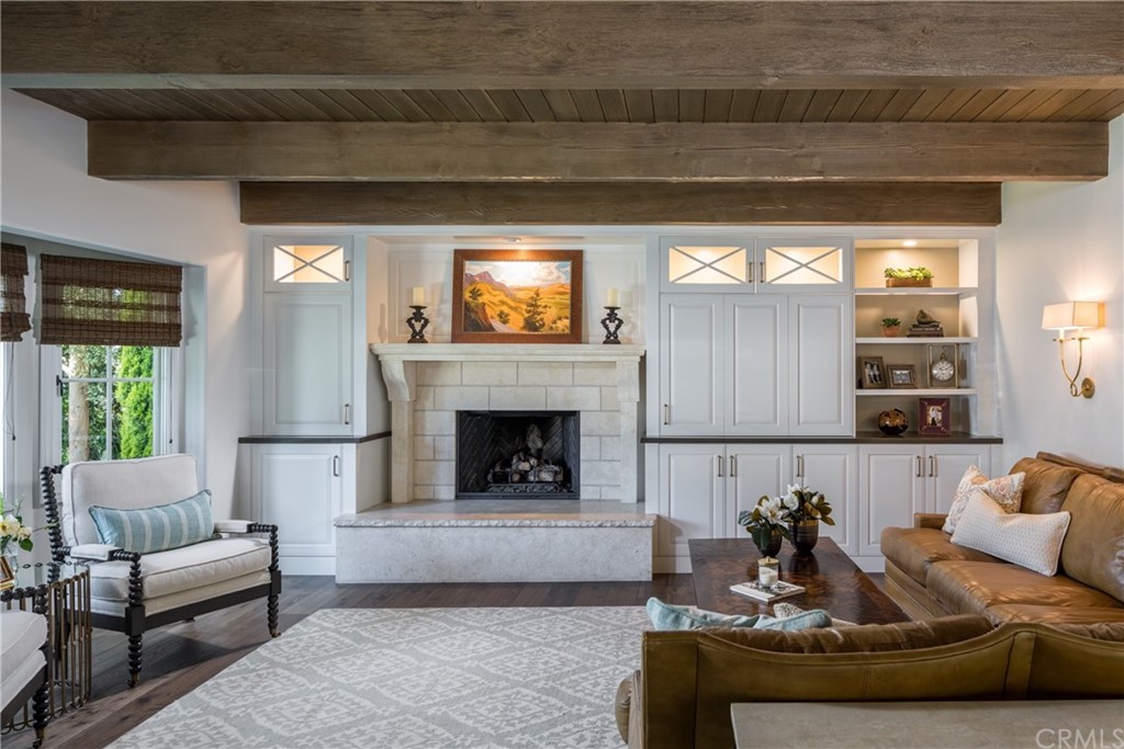5273 Appian Way Long Beach, CA 90803 - Photo 18 of 34 a living room with furniture and a fireplace