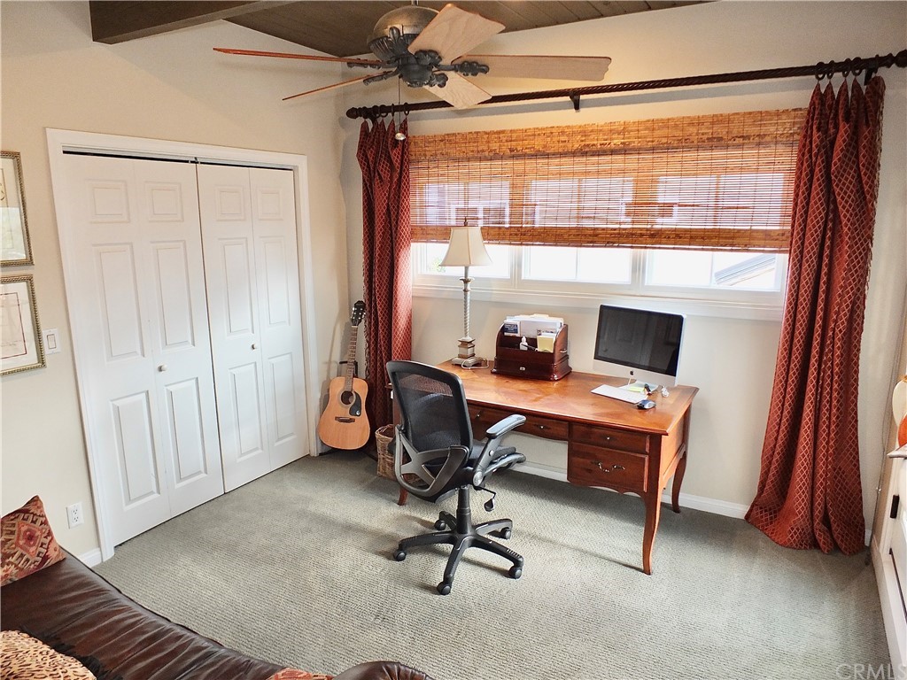 5273 Appian Way Long Beach, CA 90803 - Photo 25 of 34 a view of a workspace with furniture and a window