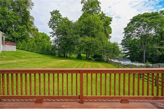 a view of a house with a big yard