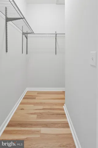 a view of a room with racks on the wall