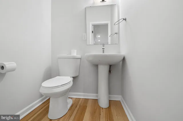 a bathroom with a sink and a toilet