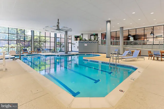 a view of a living room and dining room