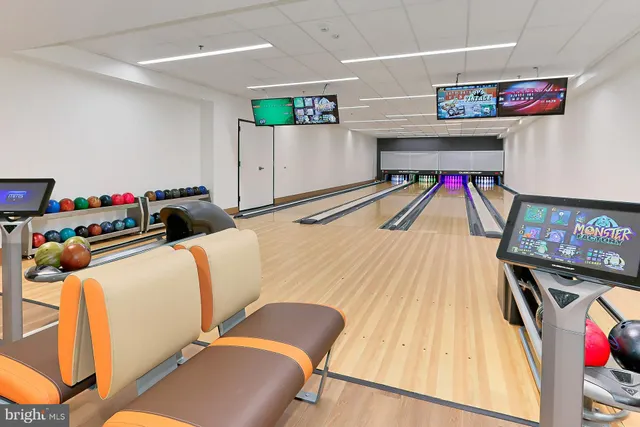 a room with furniture and a flat screen tv