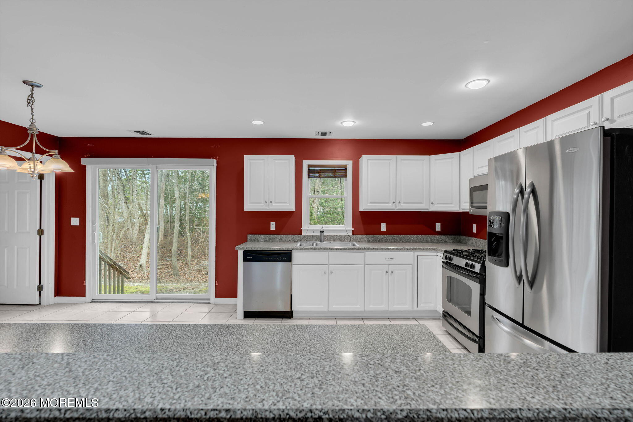 9 Forecastle Way Waretown, NJ 08758 - Photo 14 of 51 a kitchen with stainless steel appliances granite countertop a refrigerator sink and stove