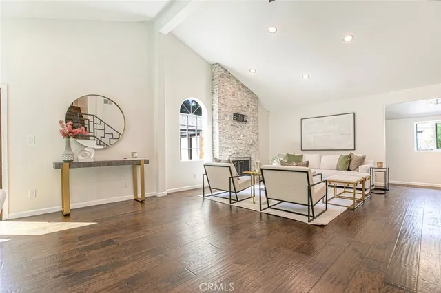 a room with furniture and wooden floor