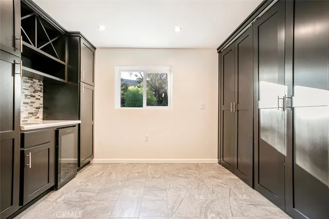 a bathroom with a sink toilet and vanity