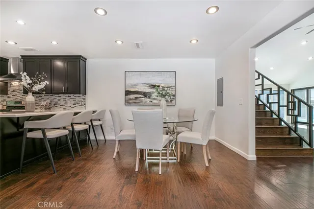 a bathroom with a shower and a bath tub