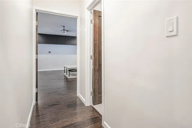 a bathroom with a sink shower and a mirror