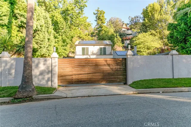 a view of a house with a back yard