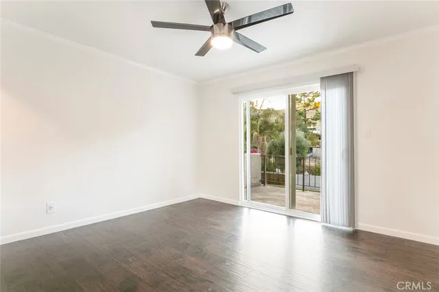 a view of backyard with swimming pool