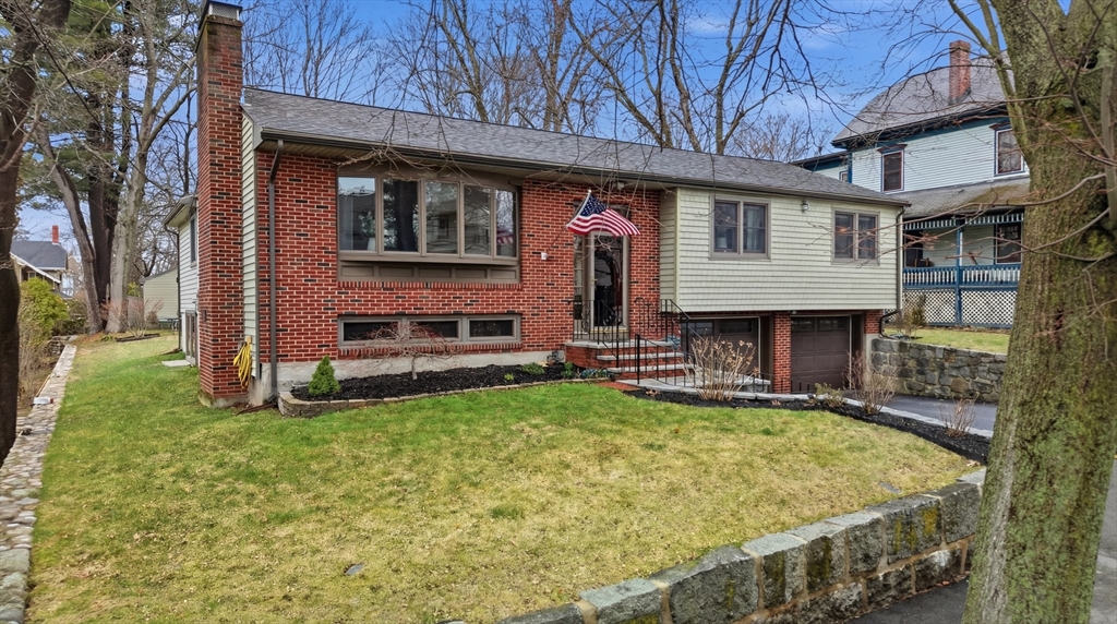 11 Lawrence Street Wakefield, MA 01880 - Photo 2 of 42 a view of a house with backyard and sitting area