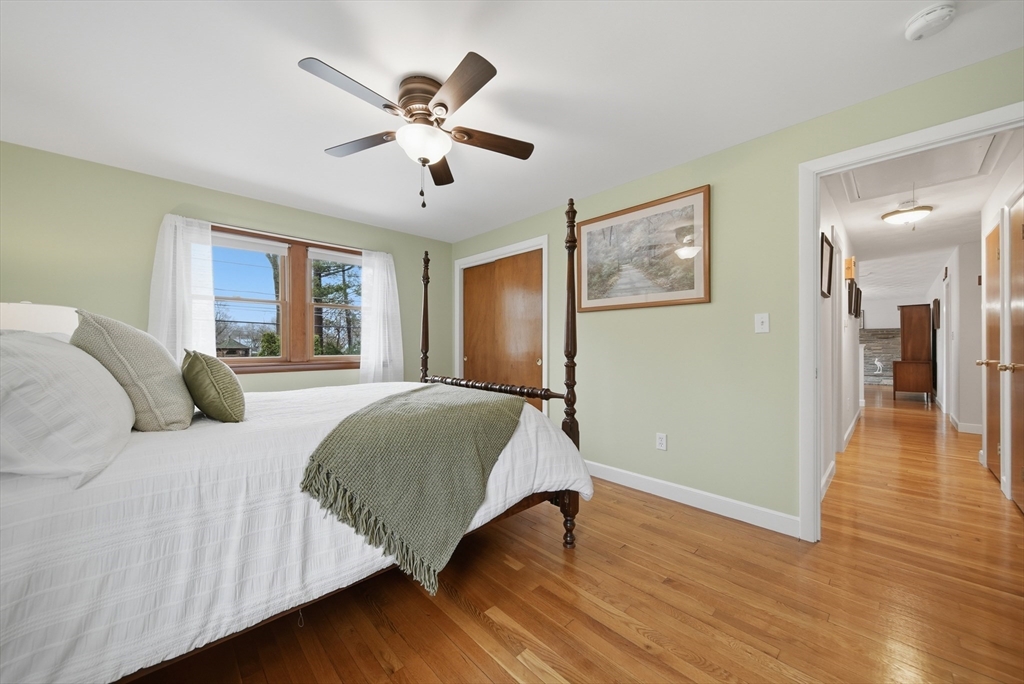 11 Lawrence Street Wakefield, MA 01880 - Photo 21 of 42 a spacious bedroom with a bed and a ceiling fan