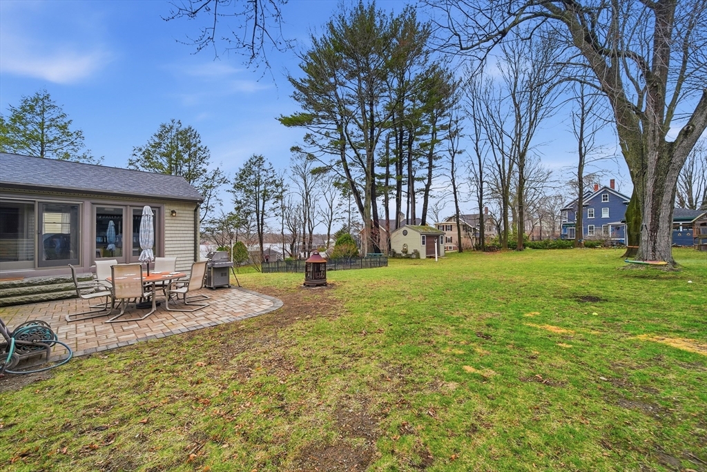 11 Lawrence Street Wakefield, MA 01880 - Photo 34 of 42 a view of a house with a backyard