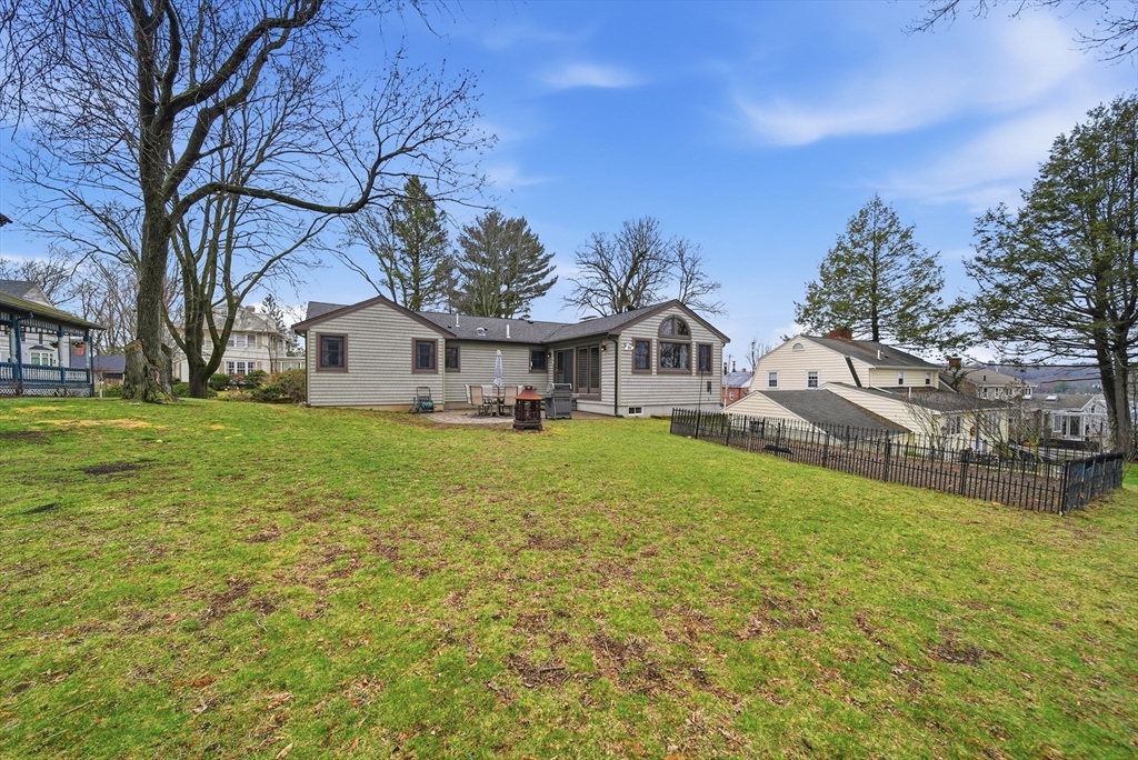 11 Lawrence Street Wakefield, MA 01880 - Photo 35 of 42 a front view of a house with garden