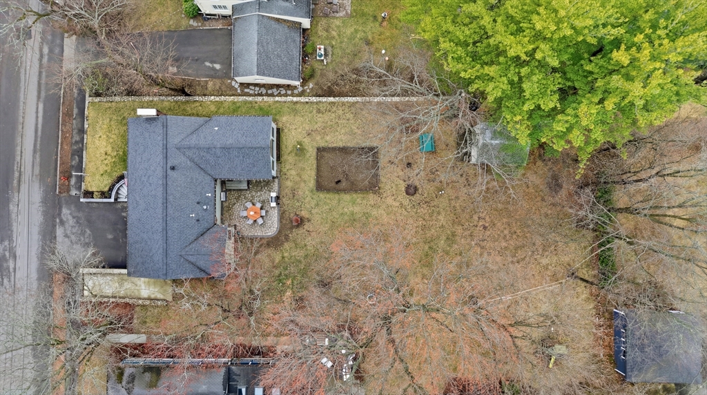 11 Lawrence Street Wakefield, MA 01880 - Photo 38 of 42 a front view of a house with a yard