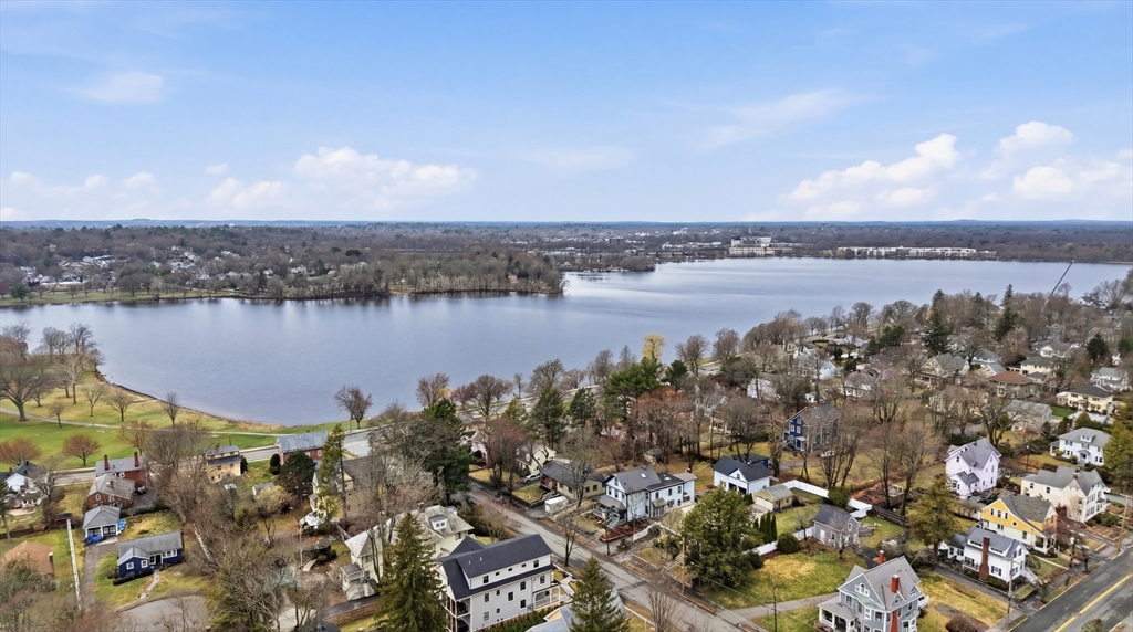 11 Lawrence Street Wakefield, MA 01880 - Photo 40 of 42 a view of a lake with a city
