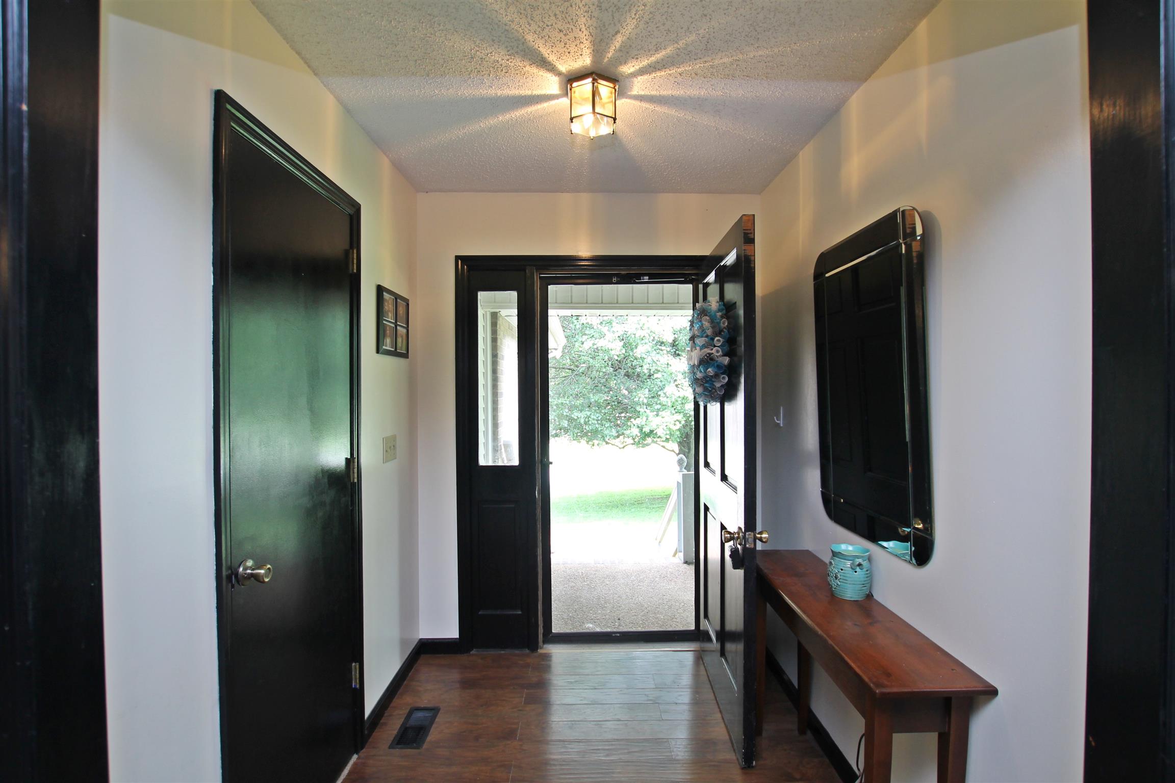 706 3rd Avenue West Springfield, TN 37172 - Photo 2 of 26 a room with window and a livingroom with furniture