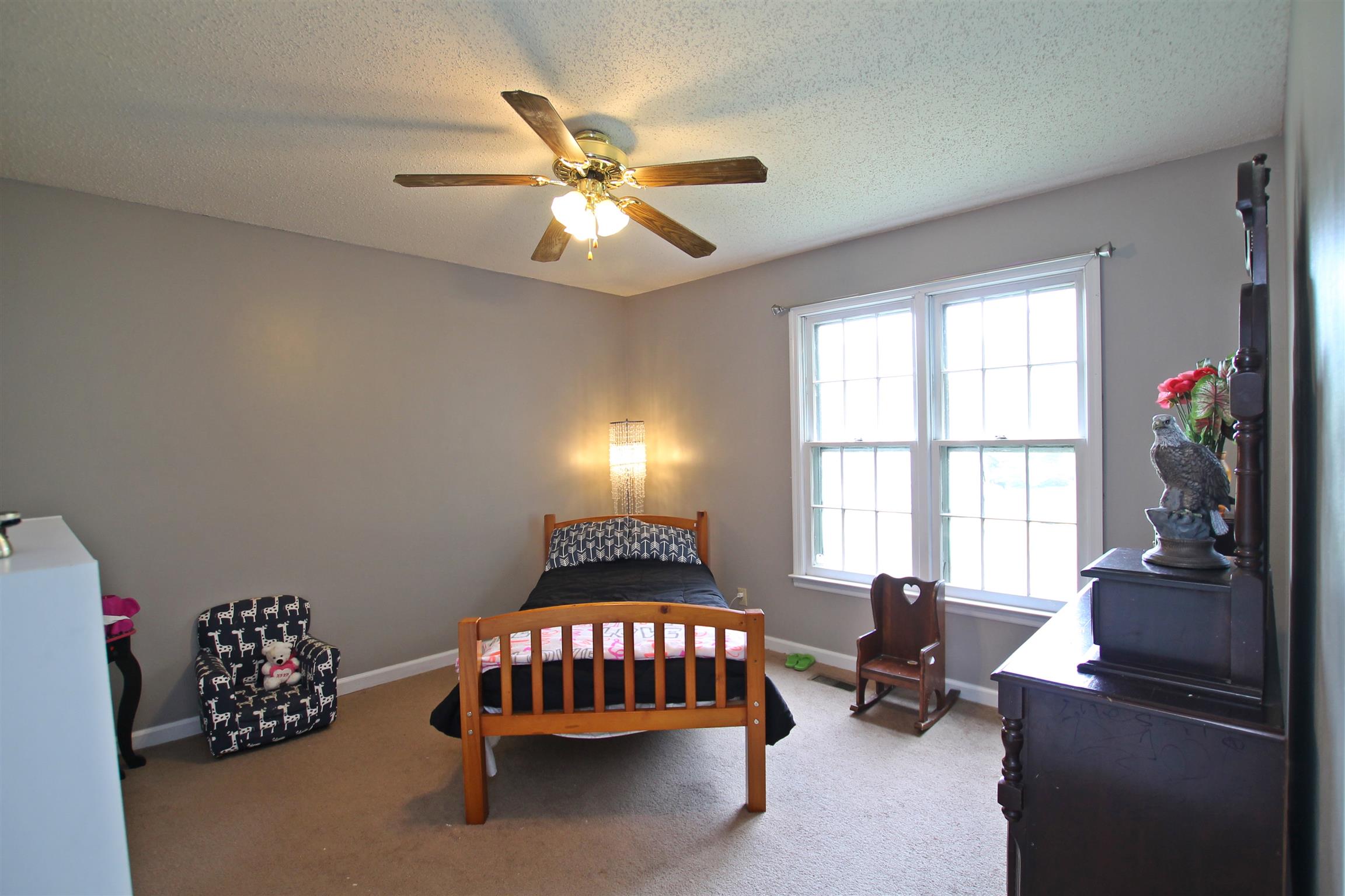 706 3rd Avenue West Springfield, TN 37172 - Photo 16 of 26 a living room with furniture and a window