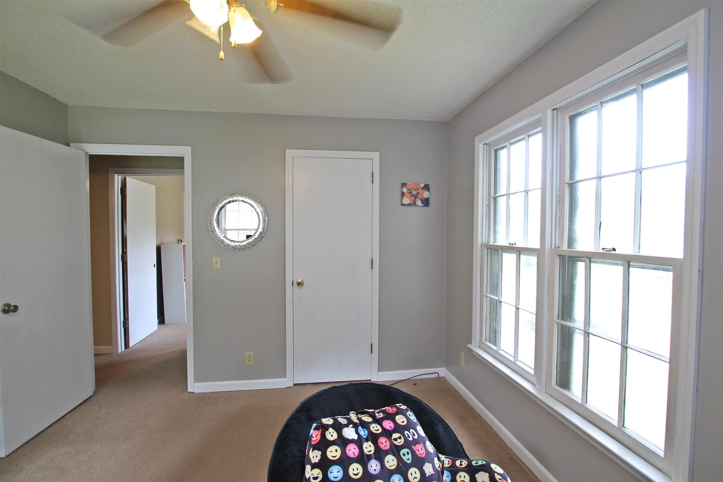706 3rd Avenue West Springfield, TN 37172 - Photo 19 of 26 wooden floor in an empty room with a window
