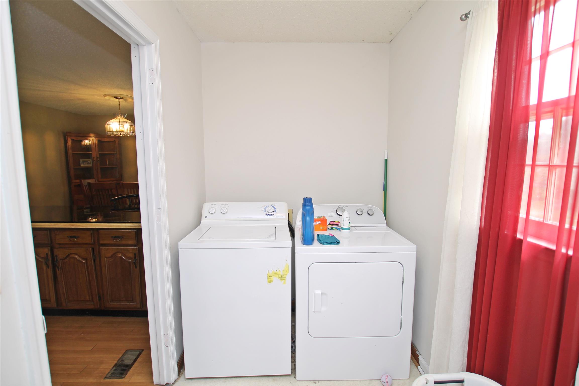 706 3rd Avenue West Springfield, TN 37172 - Photo 21 of 26 a utility room with dryer and washer