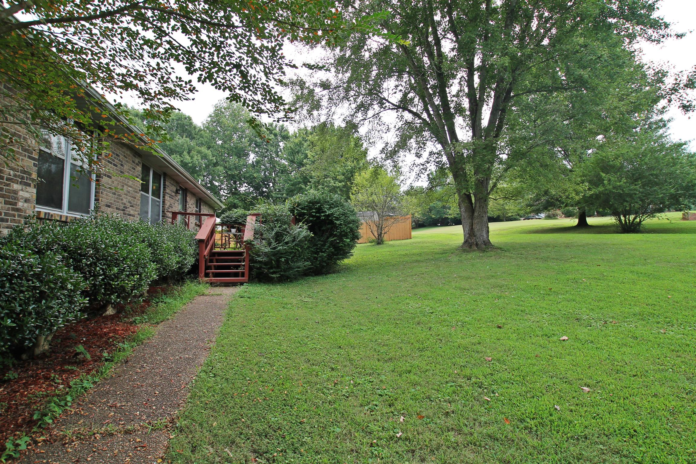 706 3rd Avenue West Springfield, TN 37172 - Photo 25 of 26 a view of an house with backyard space and garden
