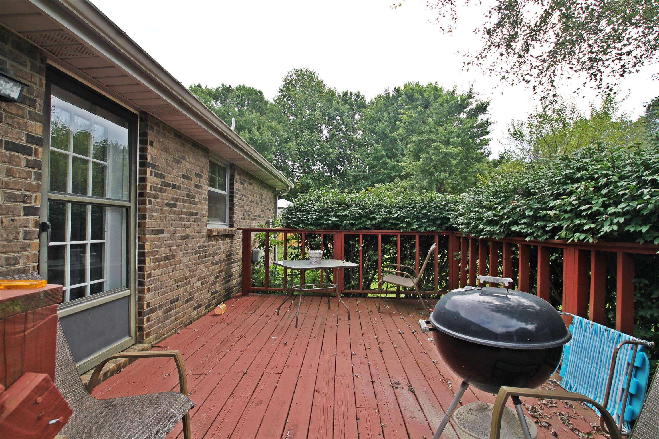 706 3rd Avenue West Springfield, TN 37172 - Photo 26 of 26 a backyard of a house with table and chairs