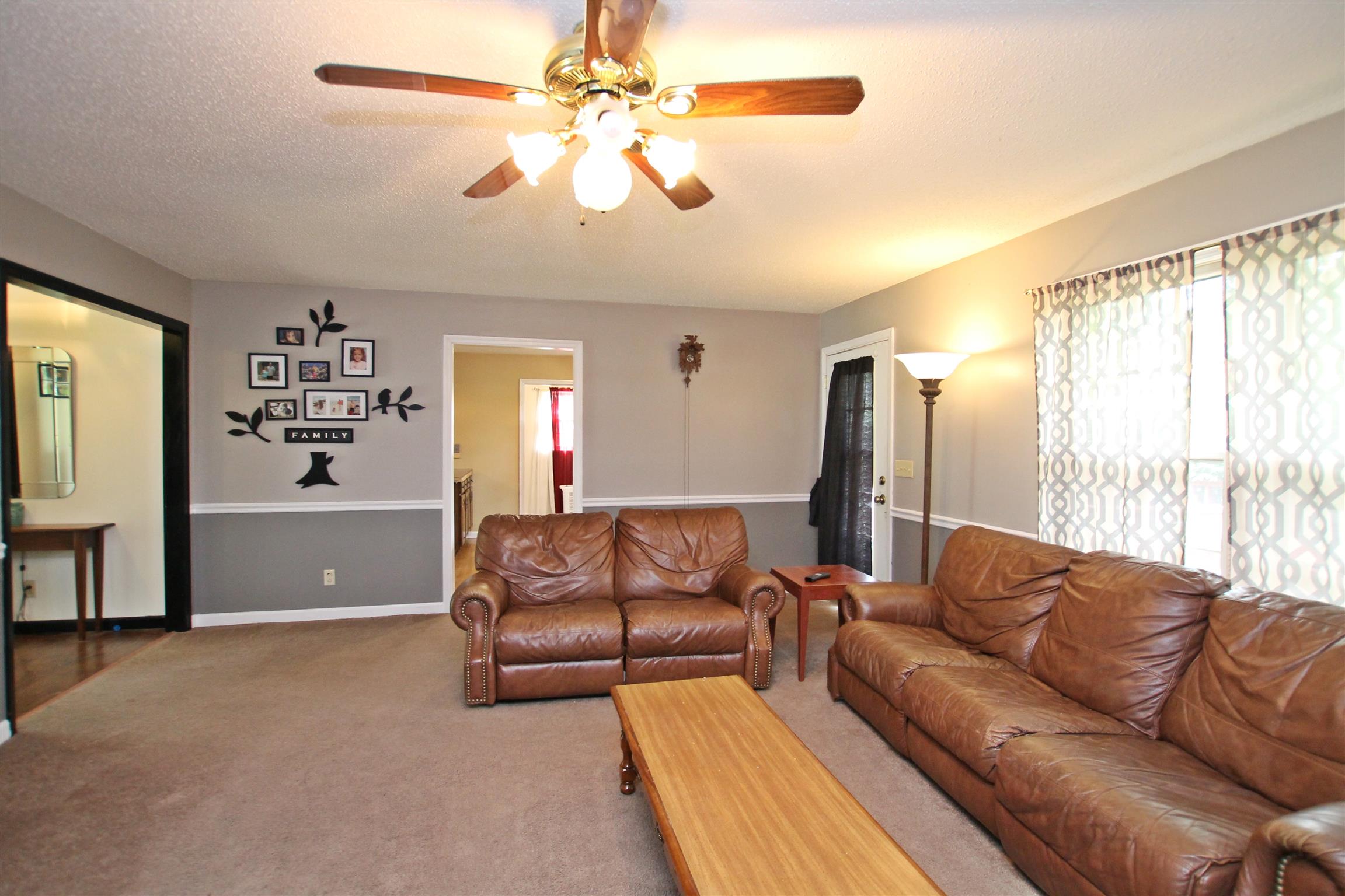 706 3rd Avenue West Springfield, TN 37172 - Photo 4 of 26 a living room with furniture and a large window