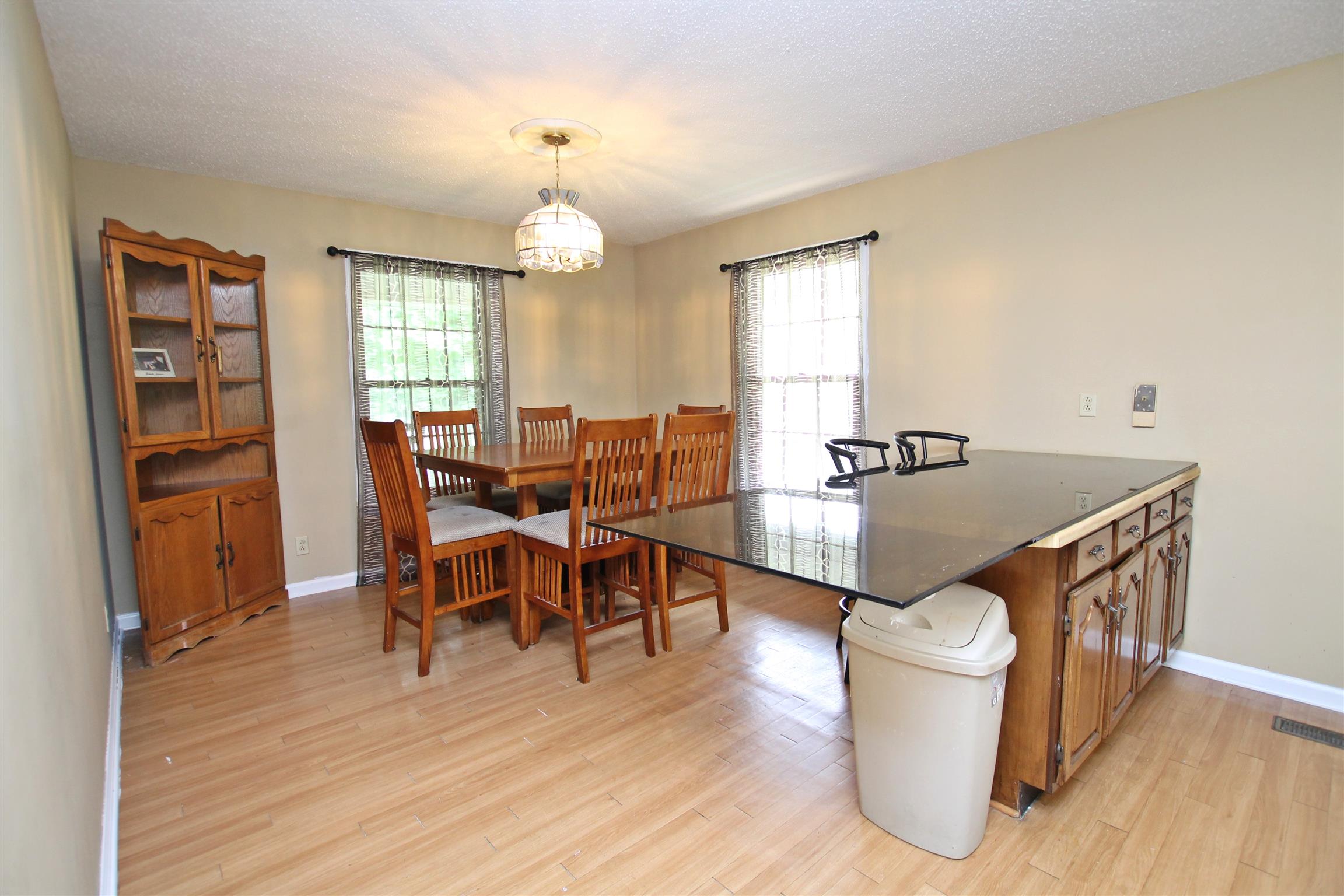 706 3rd Avenue West Springfield, TN 37172 - Photo 9 of 26 a view of a dining room with furniture and window