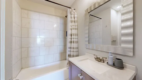 a bathroom with a sink and a tub