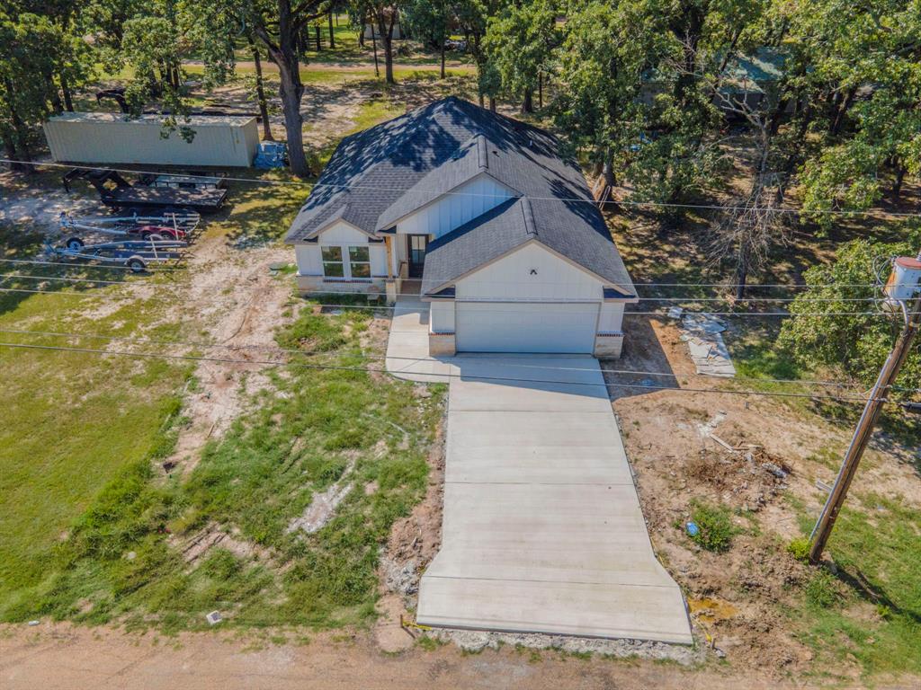 110 Red Oak Mabank, TX 75156 - Photo 27 of 30 a house view with a garden space